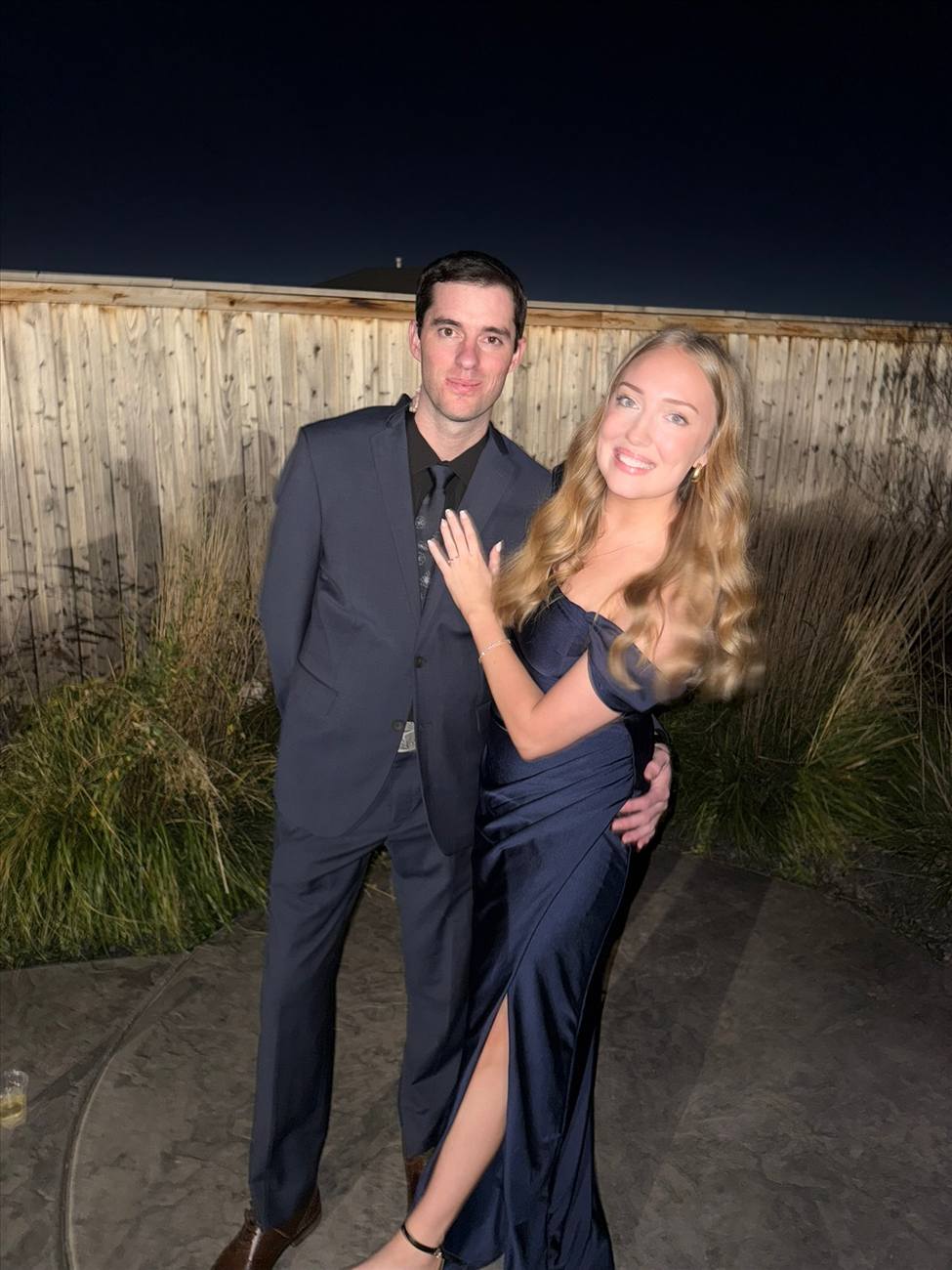 Tyler and Lauren dressed up and laughing